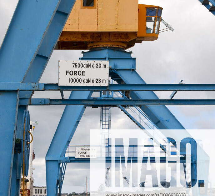 Port cranes on a dock in the port of Brest (France) port cranes on a ...