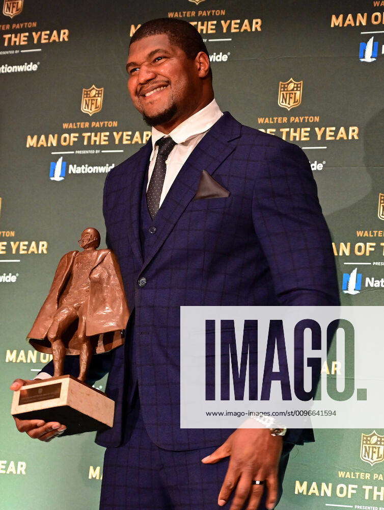 Calais Campbell of the Jacksonville Jaguars holds the Walter Paytin Man ...