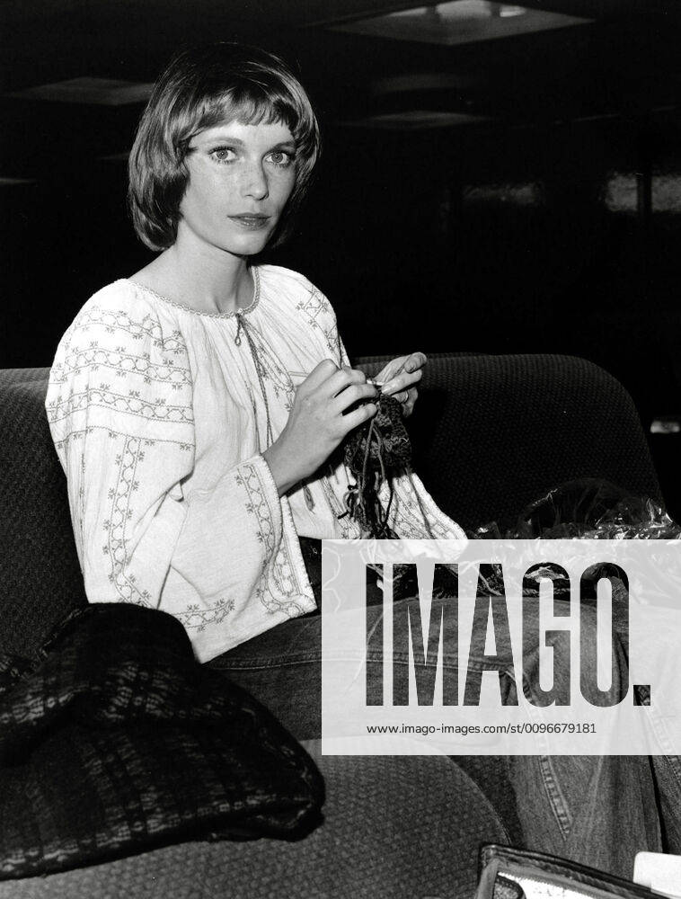 Mia Farrow knitting at Heathrow Airport (1971) Cinema Legacy Collection