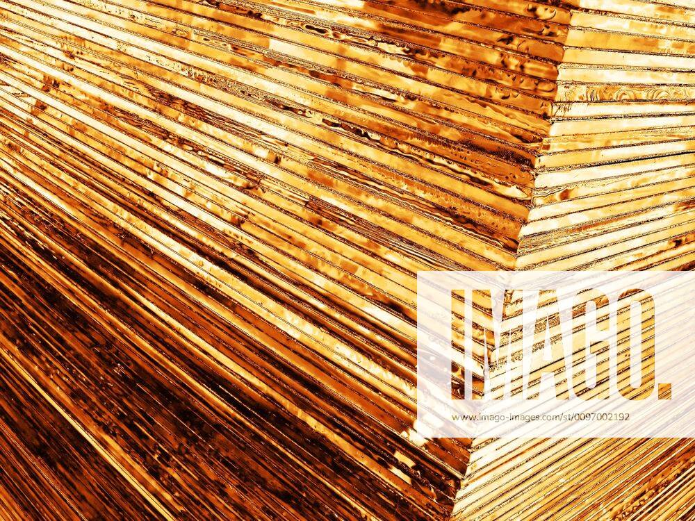 Gold sheets A pile of gold sheets took from a corner Y