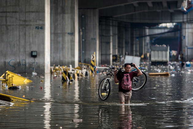 June 28, 2023, Quezon City, Metro Manila, Philippines: A woman takes ...