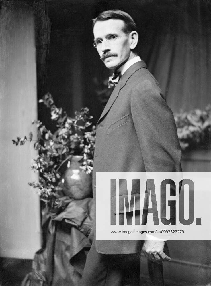 Arthur B. Davies (1862-1928), the American symbolist painter, posed in ...