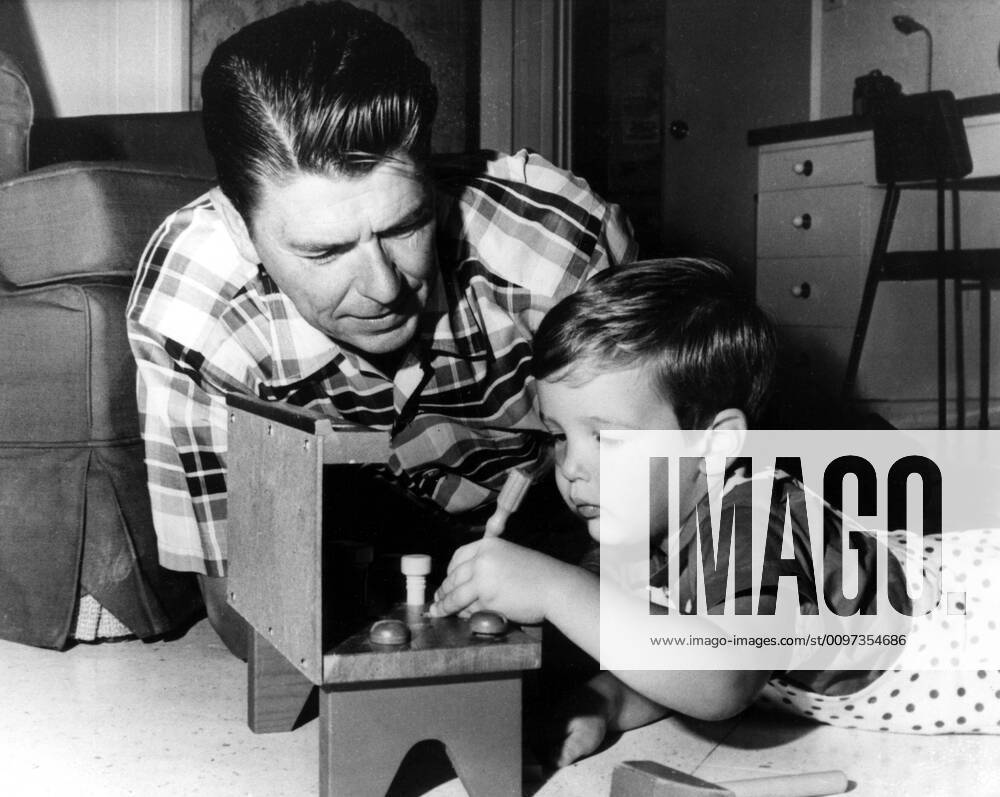 RONALD REAGAN, with son Ronald Prescott, c. 1960 Courtesy Everett ...