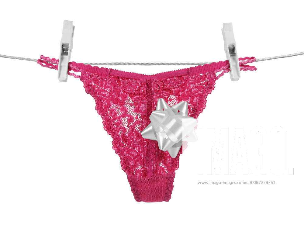Sexy pink panties (+clipping paths) Pink lacy panties with a gift bow,  hanging on a