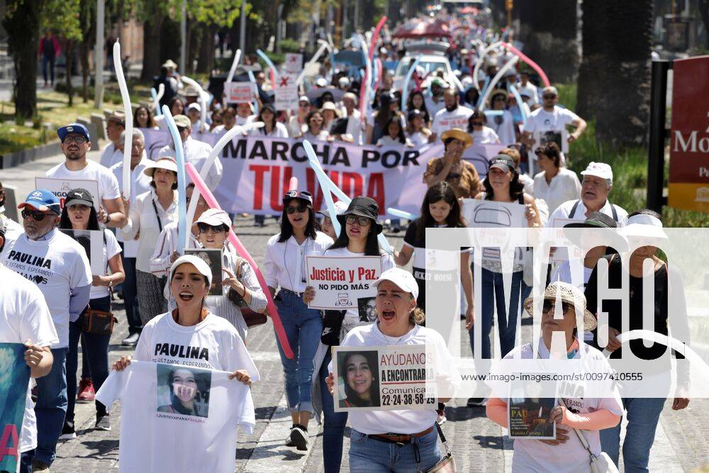 Members of the LeBaron family participate in a protest, accompanied by ...