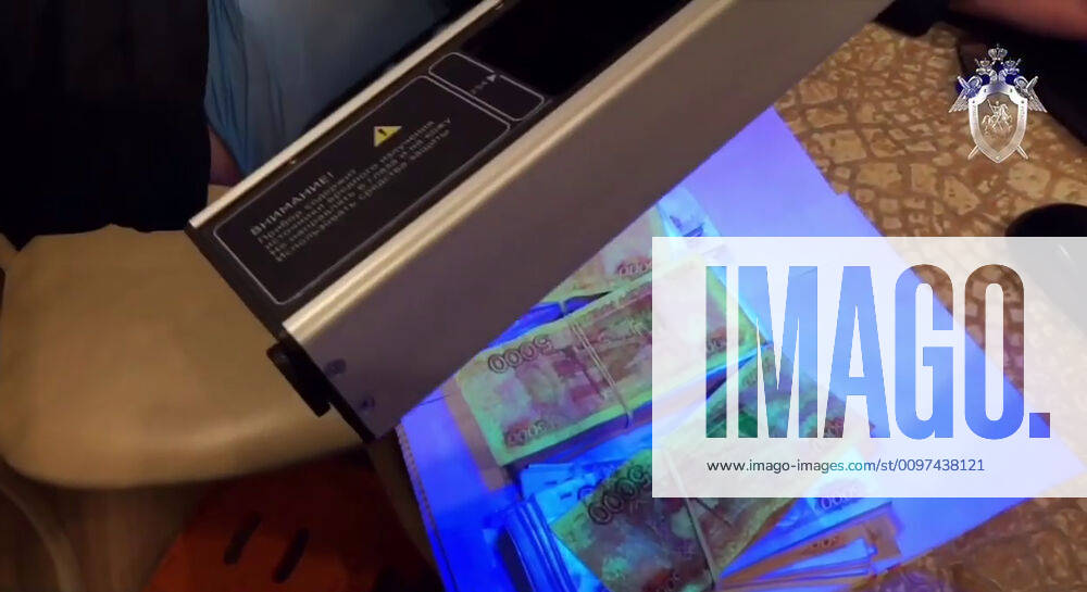 Stained Bank Note SEVASTOPOL, RUSSIA - : Pictured in this video grab are ink-stained ...