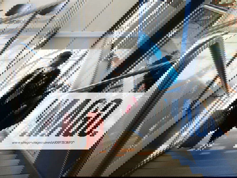 GENEVA, SWITZERLAND MARCH 4, 2020 A passenger in a face mask before