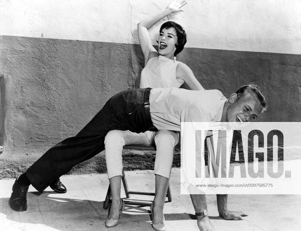 THE GIRL HE LEFT BEHIND, Natalie Wood spanks Tab Hunter in between takes,  1956. Courtesy Everett