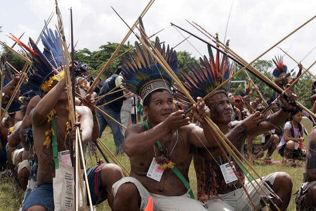 Natives of several tribes take part in an ceremony to bring attention ...