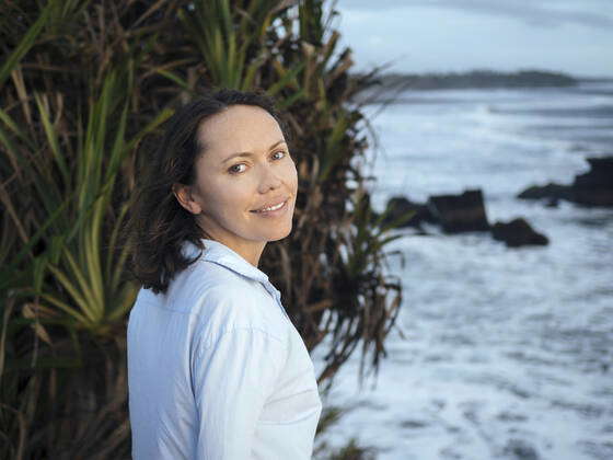 Portrait of woman at ocean coastline Denpasar, Bali, Indonesia ,model ...