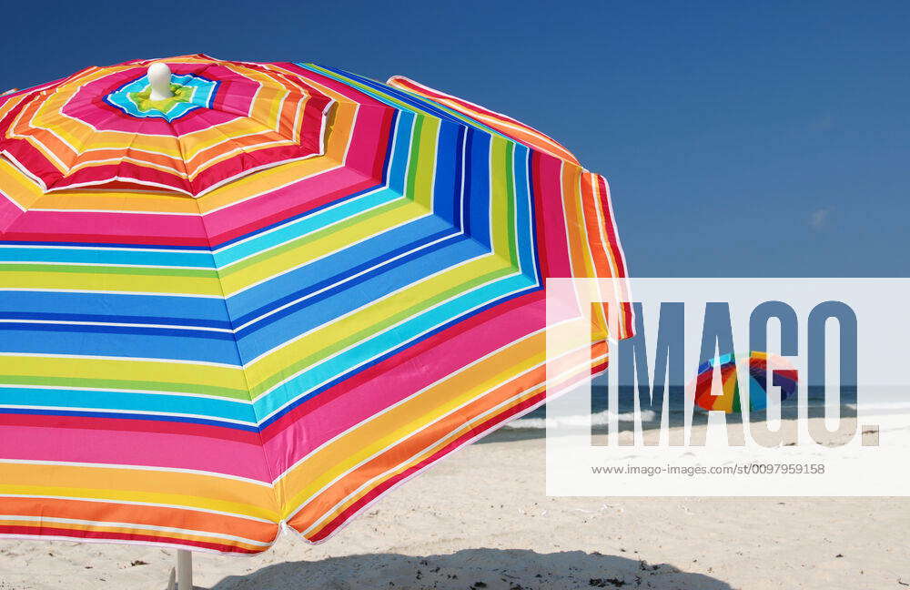 Beach Umbrellas Beach umbrellas on white sand beach. Y