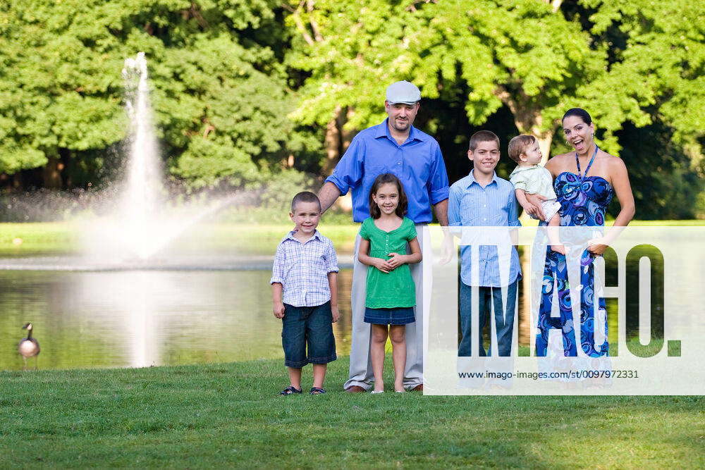 Happy Family Together An attractive young family together at the park