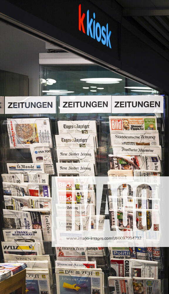 Various daily newspapers at the sales counter, Zurich Kloten, Switzerland