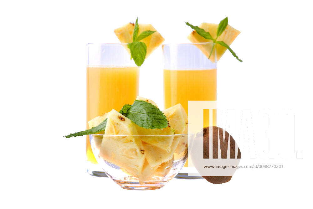 Pineapple two glasses of pineapple juice with a