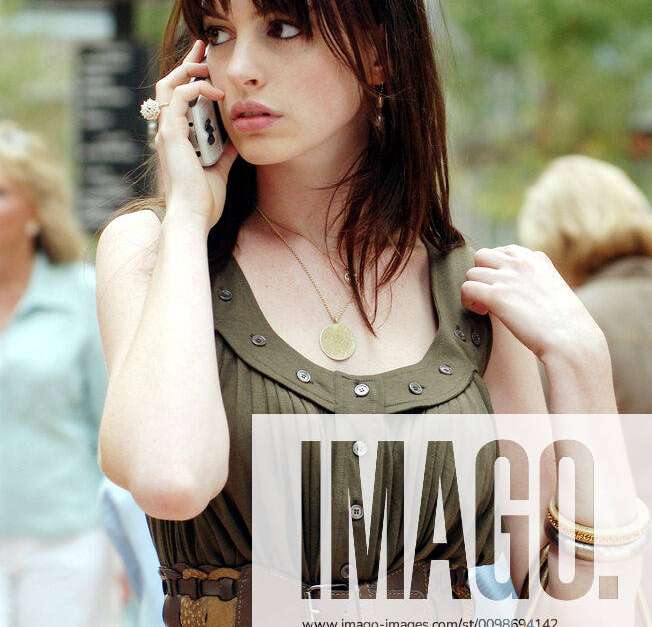 The Devil Wears Prada 8x10 Photo Anne Hathaway on Telephone in Green Dress  Sunglasses on Head kn at 's Entertainment Collectibles Store