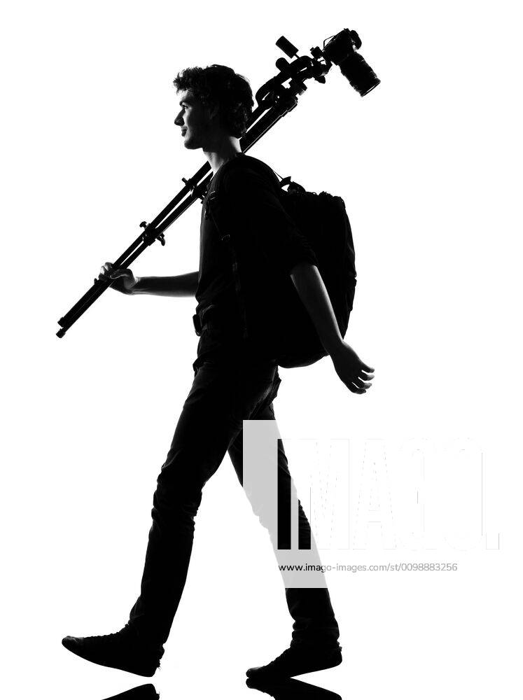 Young man silhouette photographer young man photographer silhouette in ...