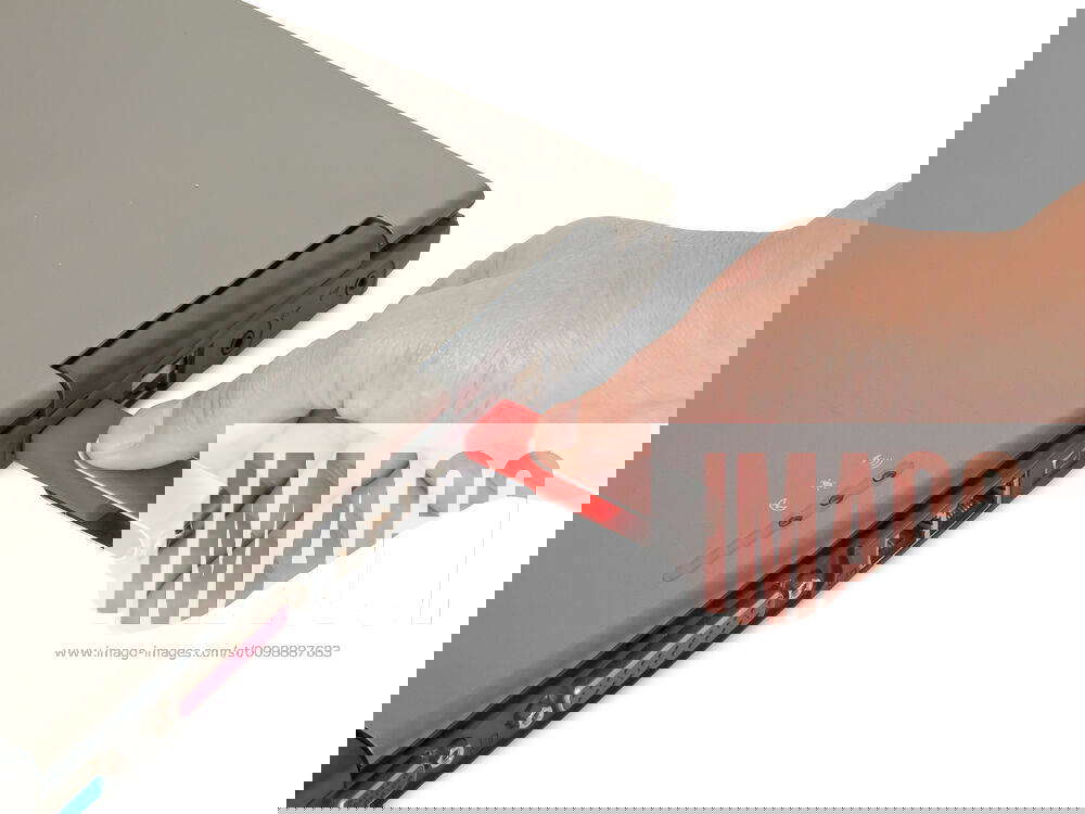 Inserting memory stick woman s hand insert usb memory stick Y