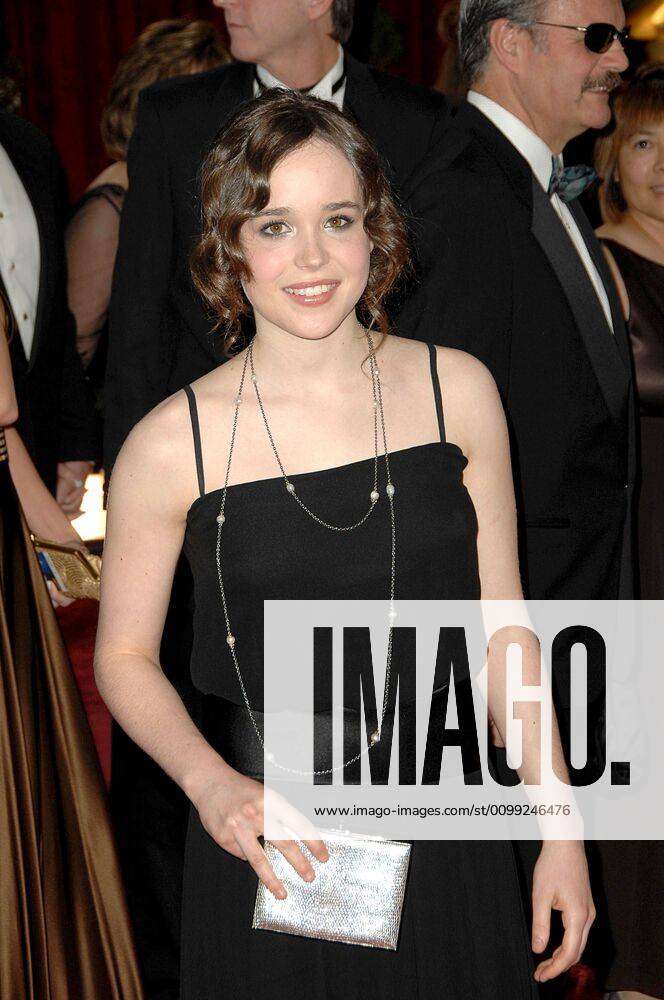 Ellen Page (wearing a vintage Jean-Louis Scherrer Haute Couture dress and  carrying a vintage Judith