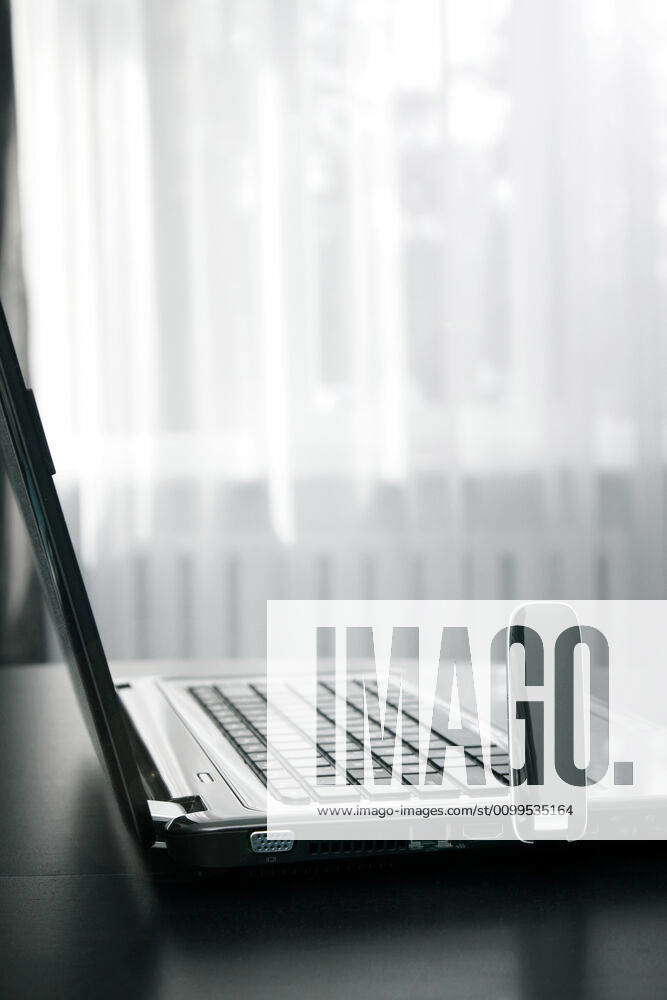 Laptop with mobile connection on the table laptop with mobile