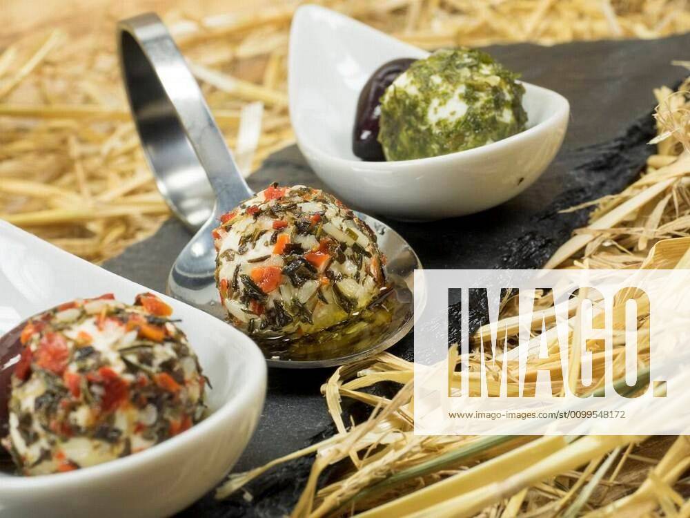 Cream cheese balls with herbs from goat s milk xFotosearchxLBRFx