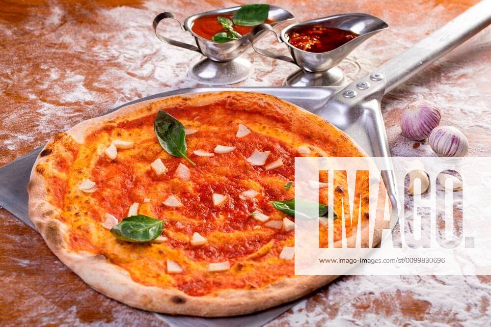 Close up of delicious marinara pizza with ingredients xFotosearchxLBRFx