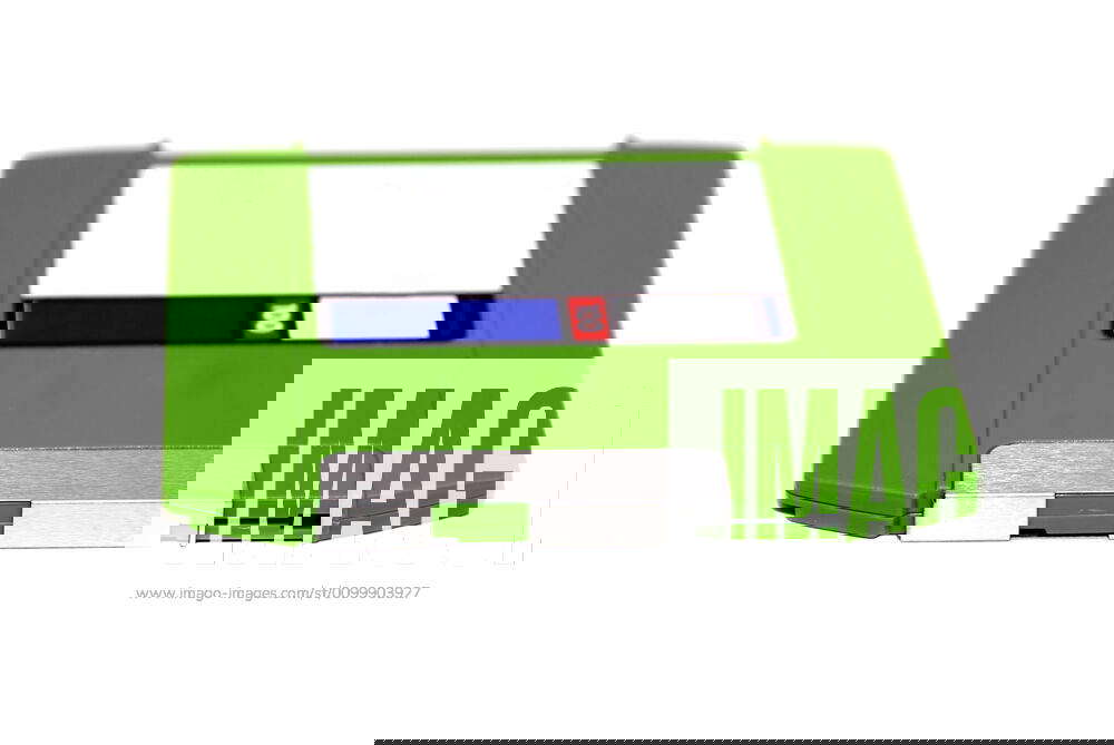 Floppy disc Green floppy disc isolated on a white back ground Y