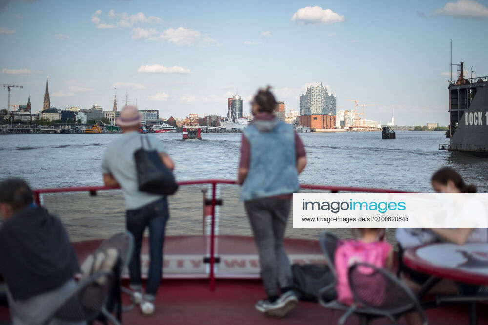 Hamburg Harbour People travel on a ferry of the Hamburg public ...