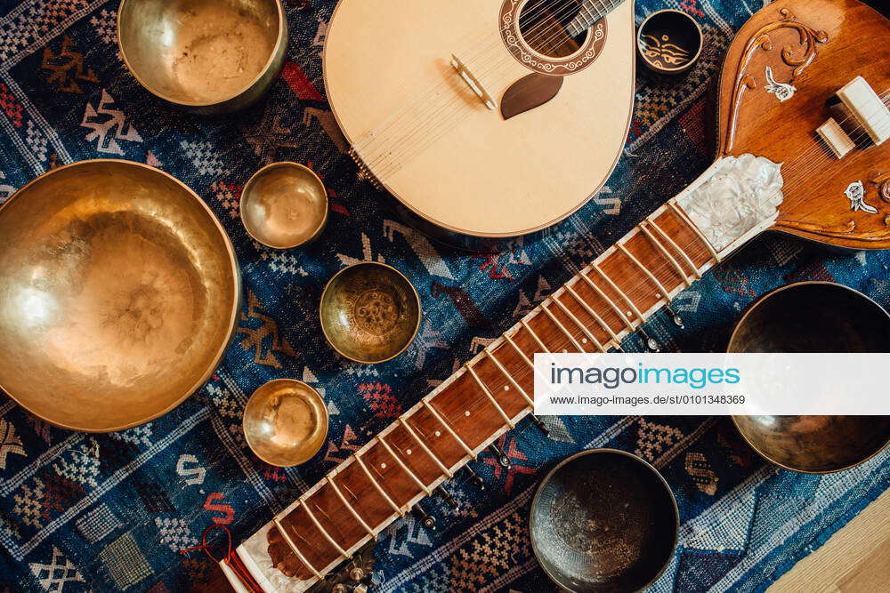 Sitar, A String Traditional Indian Musical Instrument, Close-up, Blue Lens  Effect. Dark Background, Soft Focus. Evening Of Ethnic Oriental Music.  Indian Raga Stock Photo, Picture and Royalty Free Image. Image 51779234.