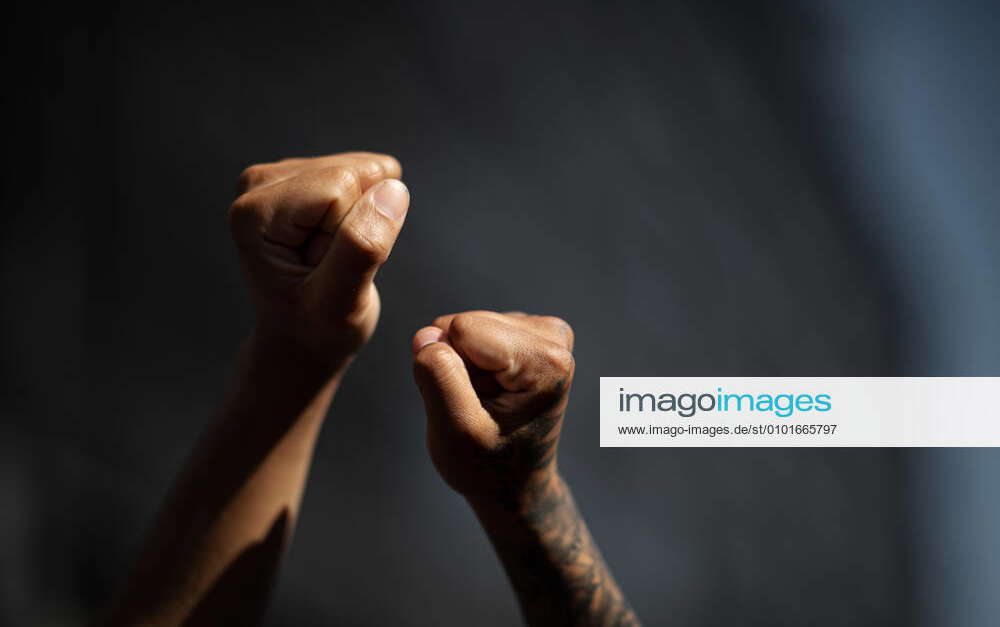 200613 Demonstrator™s clenched fists during a protest over the death of