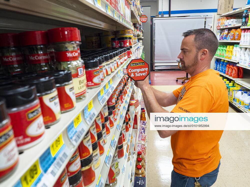 June 30, 2020, Jewell, Iowa, U.S GARREN ZANKER stocks the shelves in