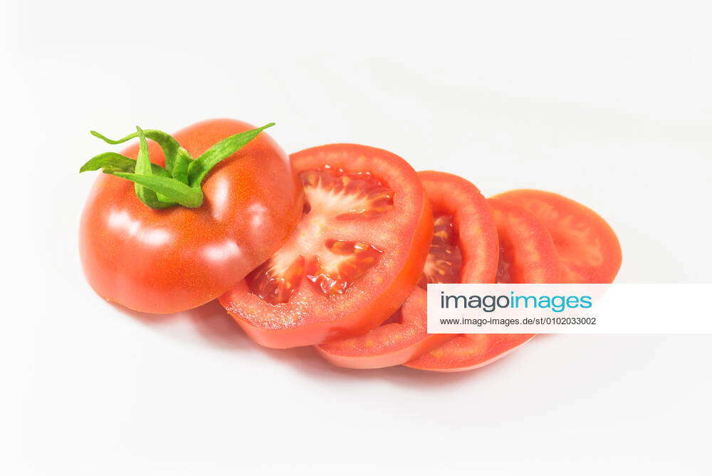 Sliced tomatoes isolated on white background