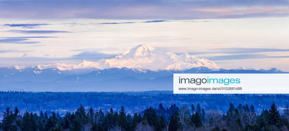 View of snow-covered mountains from Surrey, BC; Surrey, British ...