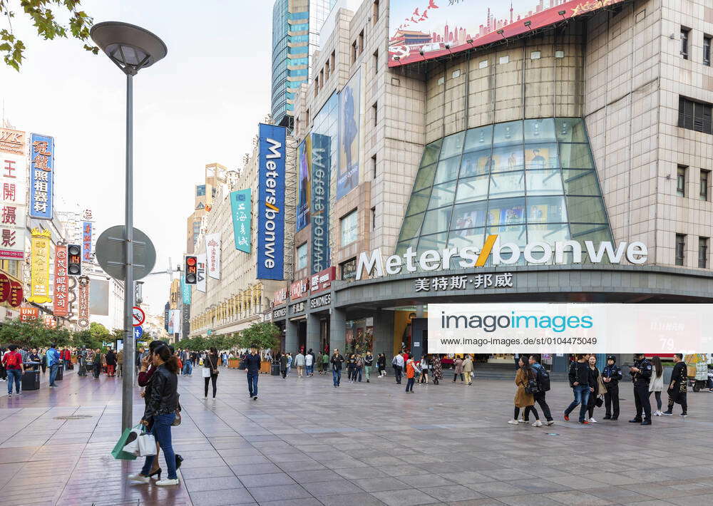 The Famous Tourist Shopping Street In Shanghai, China, Nanjing Road ...