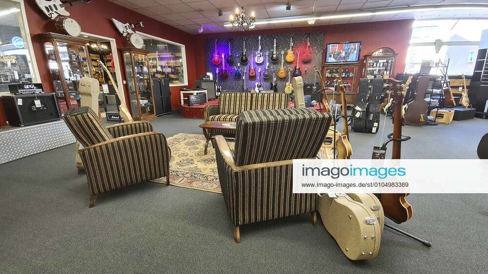 stylishly furnished music store with guitars, Deutschland Music store
