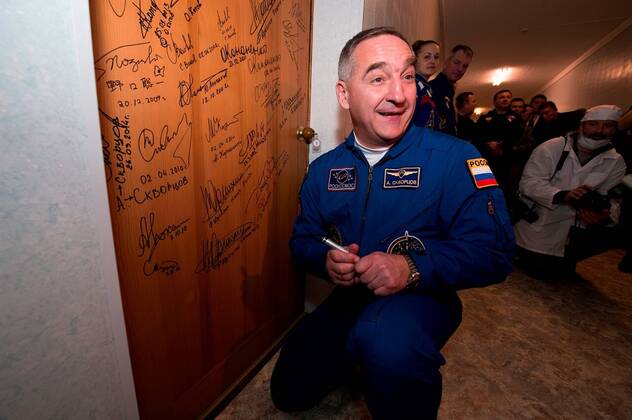 Expedition 23 Soyuz Commander Alexander Skvortsov has his Russian Sokol ...