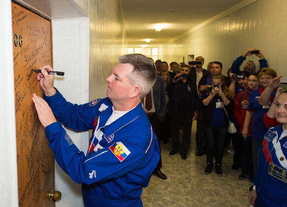 Expedition 23 Soyuz Commander Alexander Skvortsov has his Russian Sokol ...