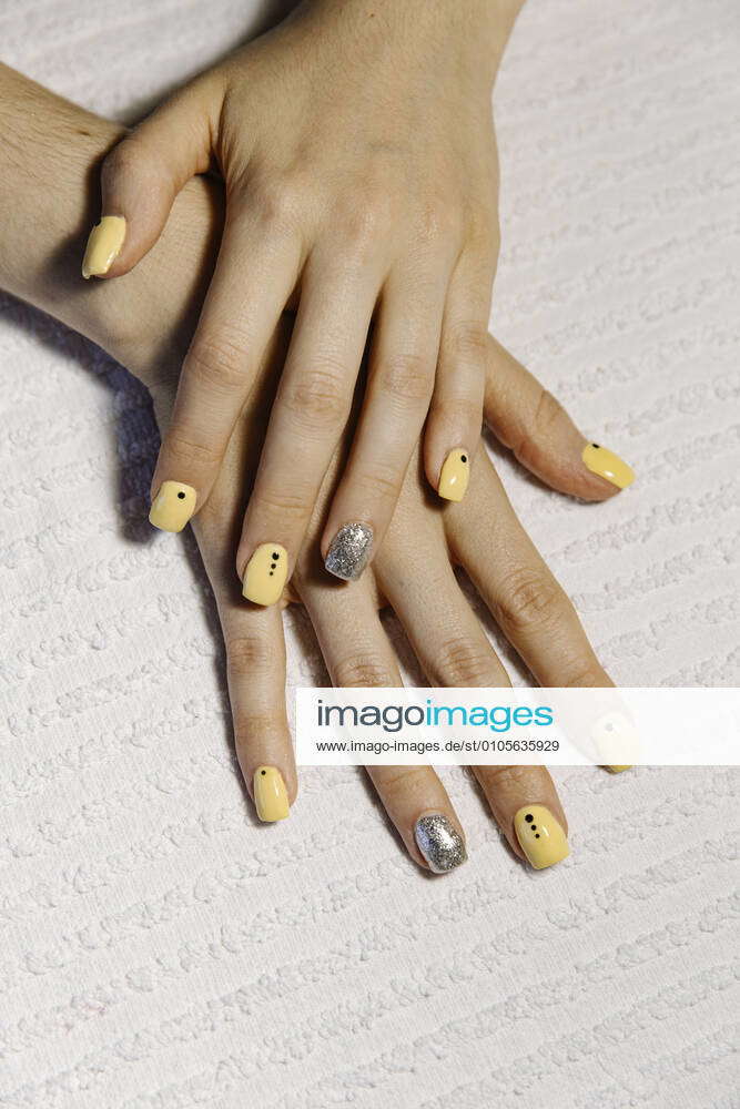 From above anonymous female demonstrating trendy fresh acrylic nails Zaragoza, Aragon, Spain CR_JDSE