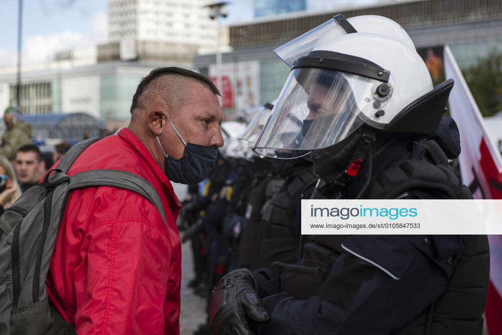 Warsaw, Poland: A protester is seen arguing with the riot police during the