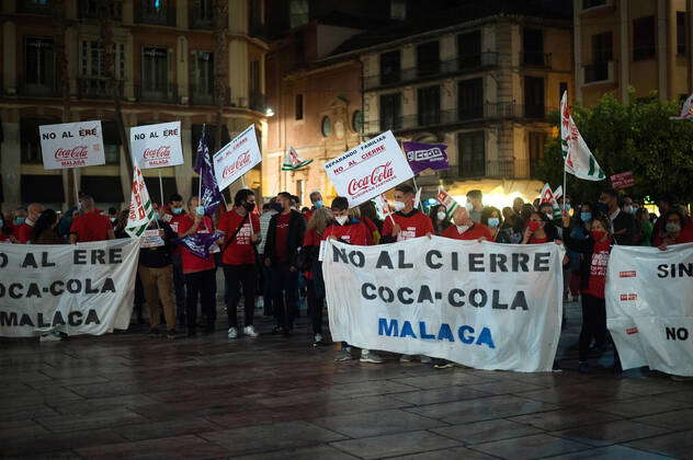 Protesting Coca Cola Malaga, Spain: Protesters seen with banners and placards during the ...