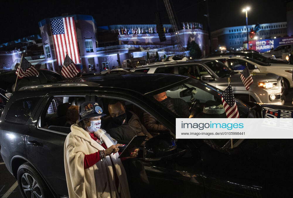 Lydia Massey watches election results with friends during Democratic ...