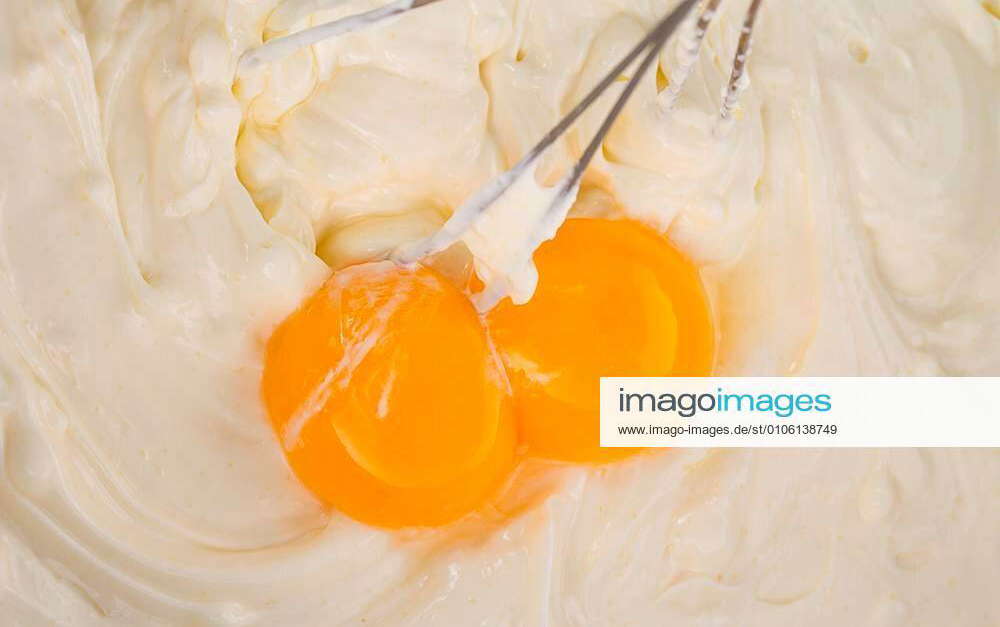 Mix of cream with eggs in process of making xFotosearchxLBRFx xOstancovx