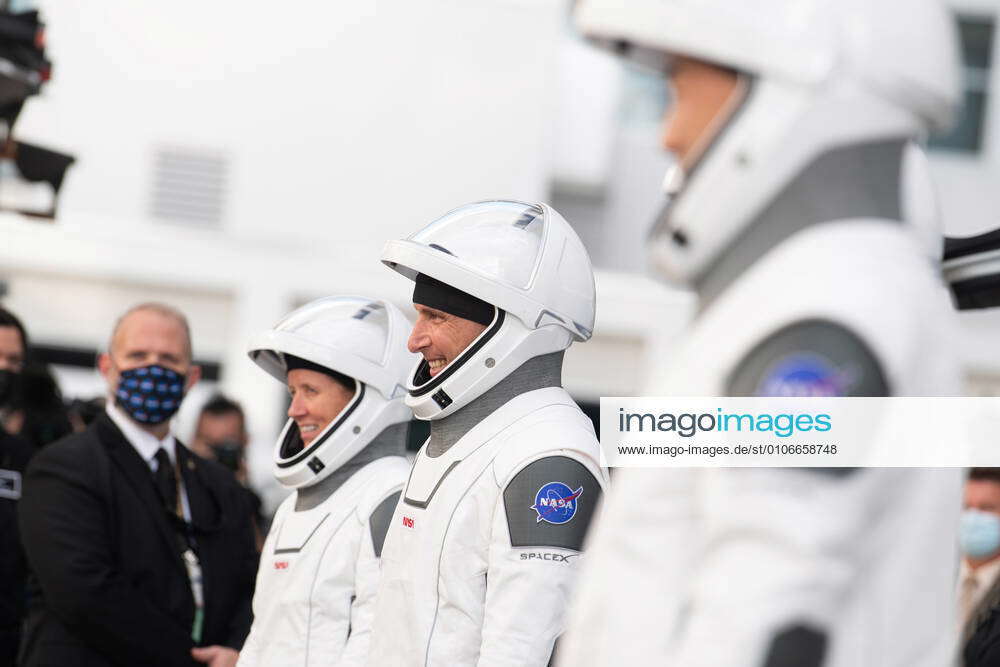 NASA astronauts Mike Hopkins, center, Shannon Walker left, and Japan ...