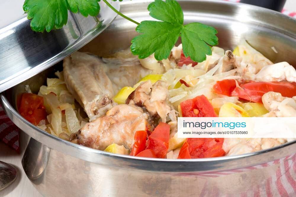 Ragout of vegetables zucchini, cabbage, onions and tomatoes with