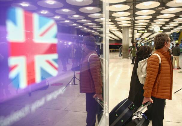 Passengers in the arrivals area of terminal T4 at Adolfo Suarez Madrid ...