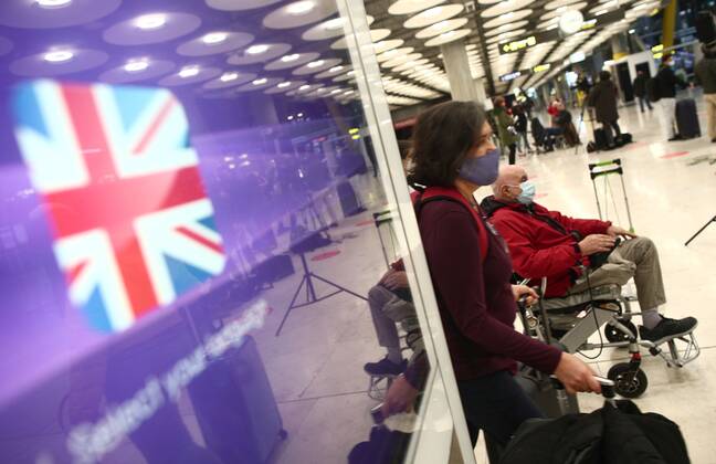 Passengers in the arrivals area of terminal T4 at Adolfo Suarez Madrid ...