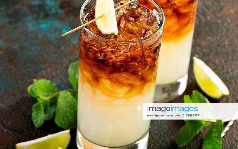 Dark and stormy cocktail with ginger ale and rum xFotosearchxLBRFx