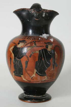 Attic black-figure oinochoe. Decoration of Dionysos and Ariadne, both ...