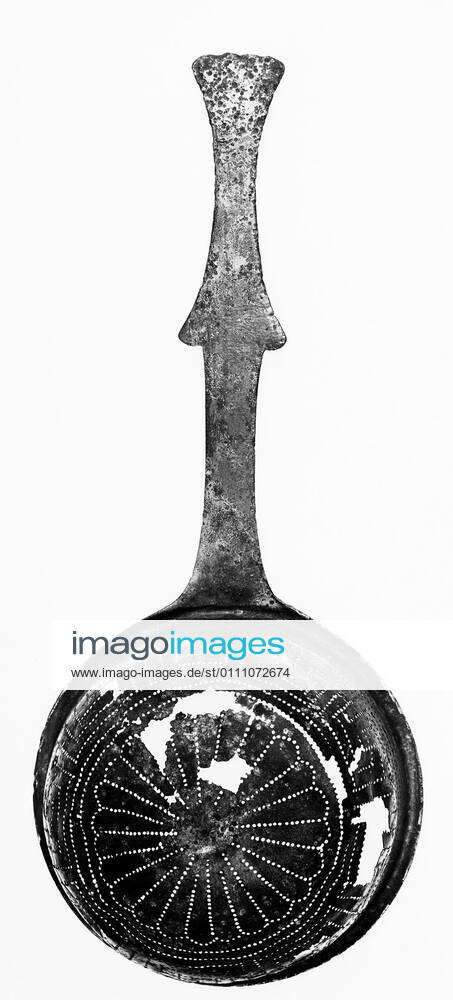 Colander, deep hemispherical of bronze, with long stem. Decorated with ...