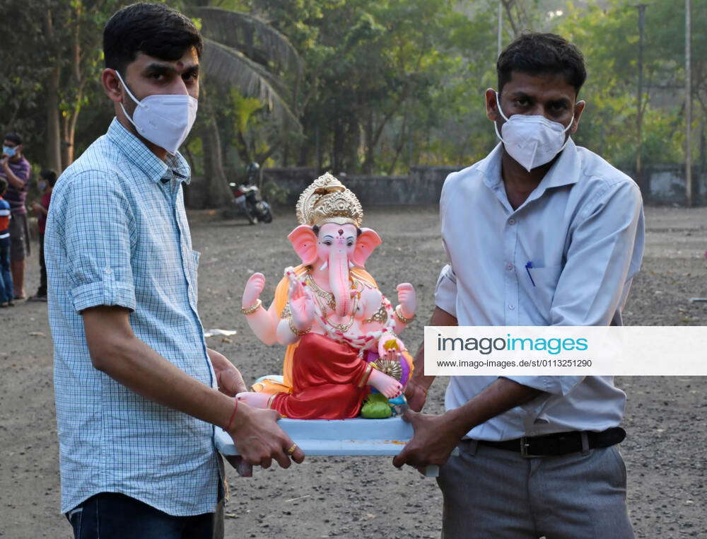 February Mumbai Maharashtra India Devotees Wearing Masks Carry The Idol Of Hindu God