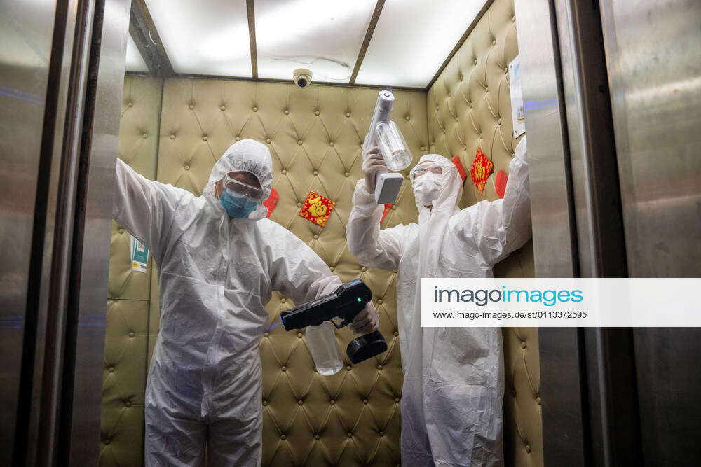 February 18, 2021, Hong Kong, China Employee wearing PPE (Personal